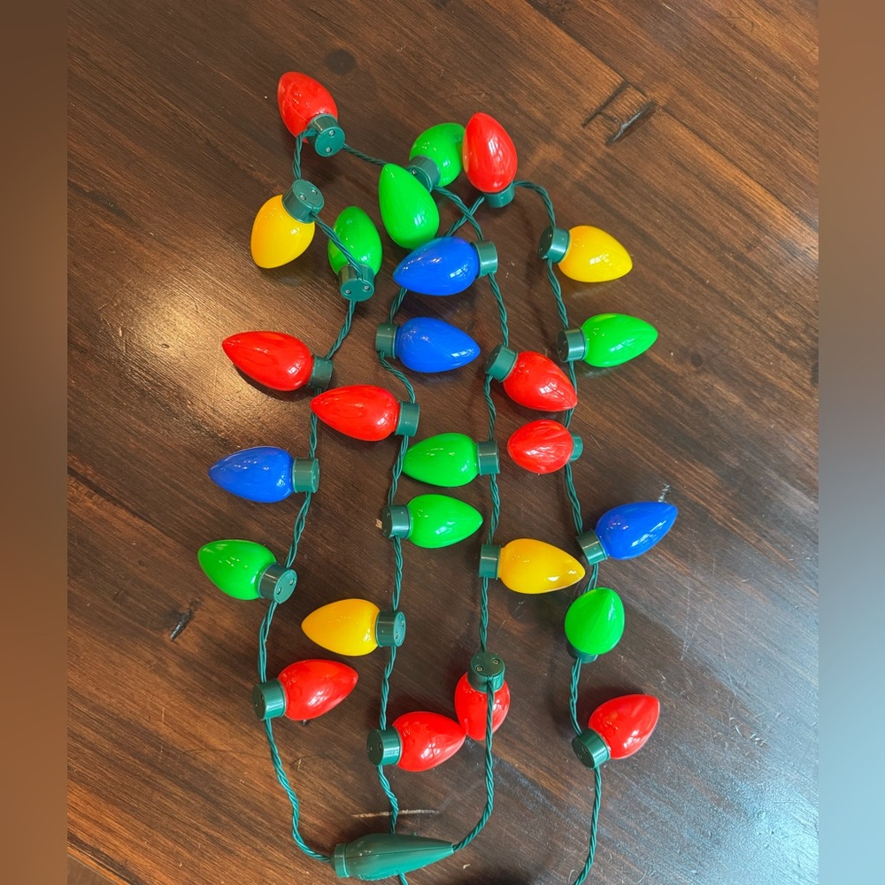Colorful String Lights Christmas necklace. Needs batteries.
